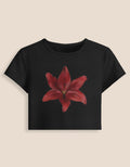 Red Lily Baby Tee featuring a bold red lily design on a black cropped t-shirt for trendy style and comfort.