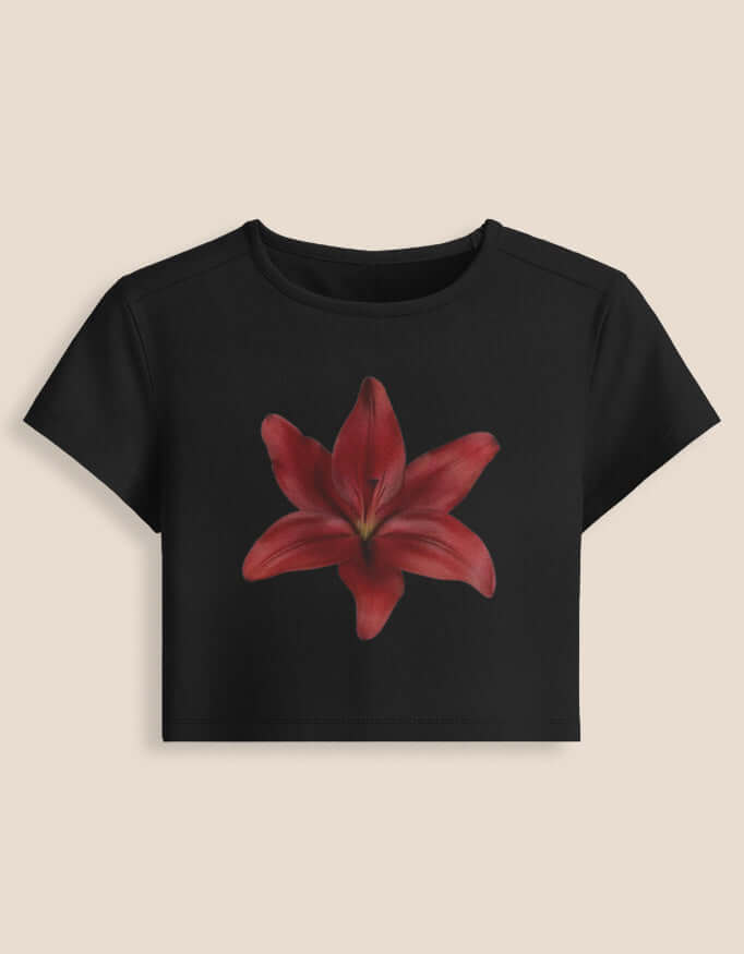 Red Lily Baby Tee featuring a bold red lily design on a black cropped t-shirt for trendy style and comfort.